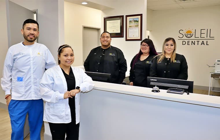 The doctors and team at the front desk