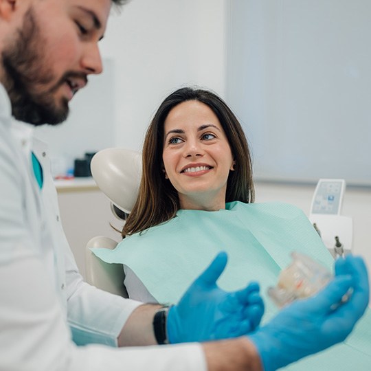 Woman smiling in the dental chair