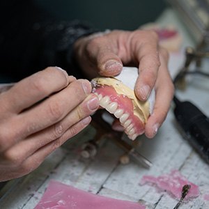 Lab tech carving dentures