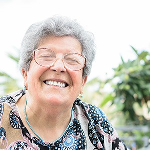 Woman smiling with dentures