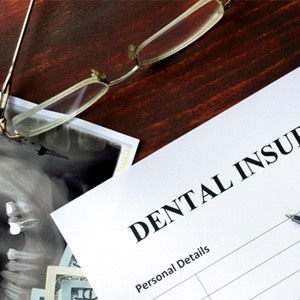 dental insurance form on table