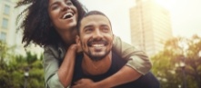 Man and woman with aligned smile after cosmetic dentistry